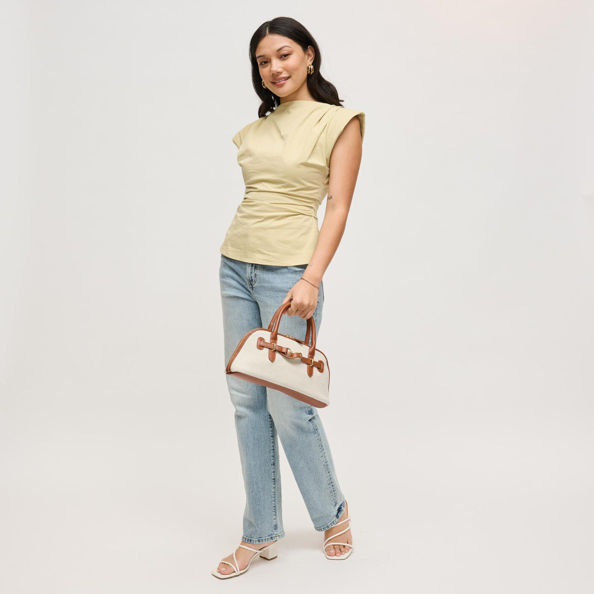 Woman wearing Ivory Tan Urban Expressions Amelia Crossbody 840504207877 View 4 | Ivory Tan