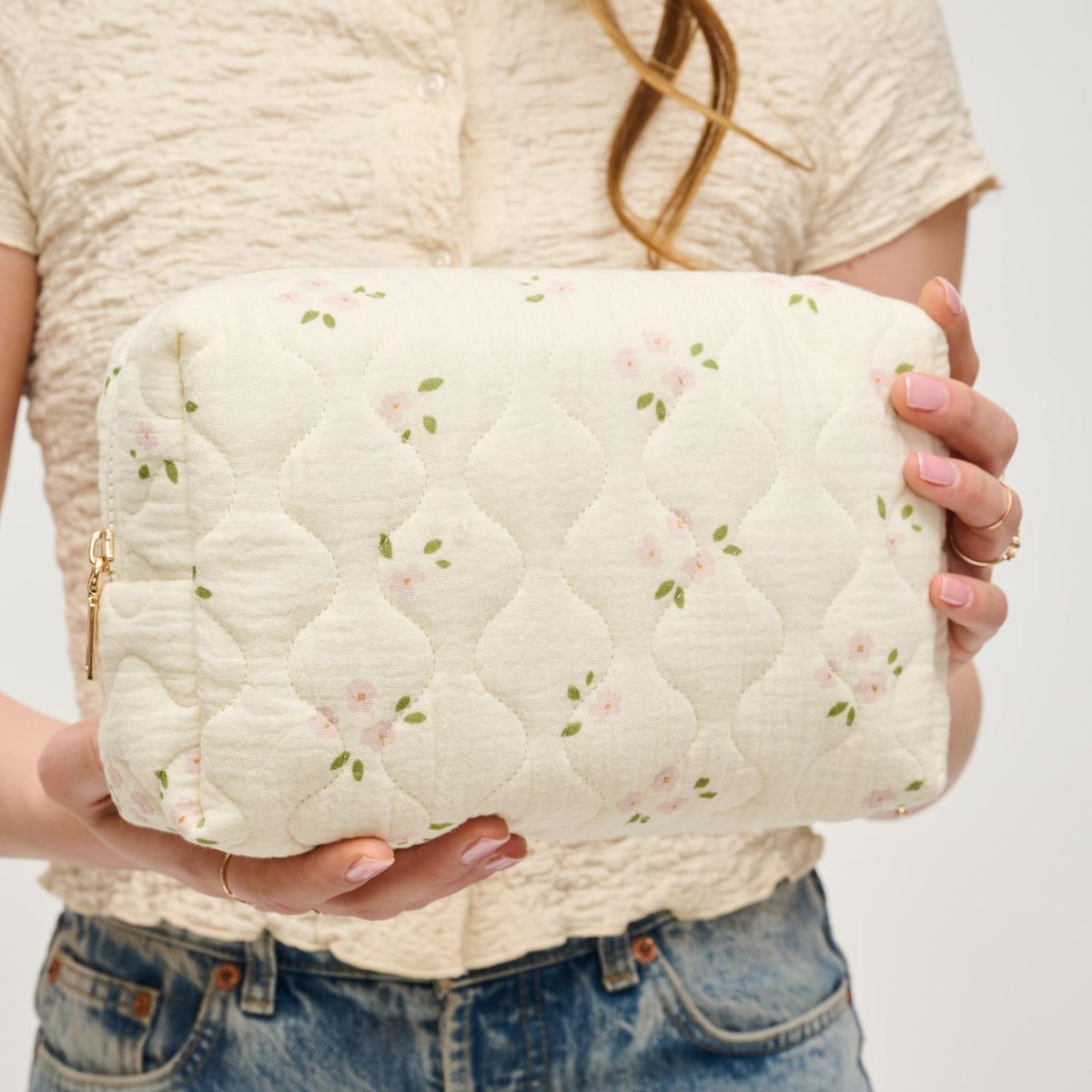 Woman wearing Pink Rose Urban Expressions Quilted Keeper Cosmetic & Travel Organizer Pouch 840611195425 View 3 | Pink Rose