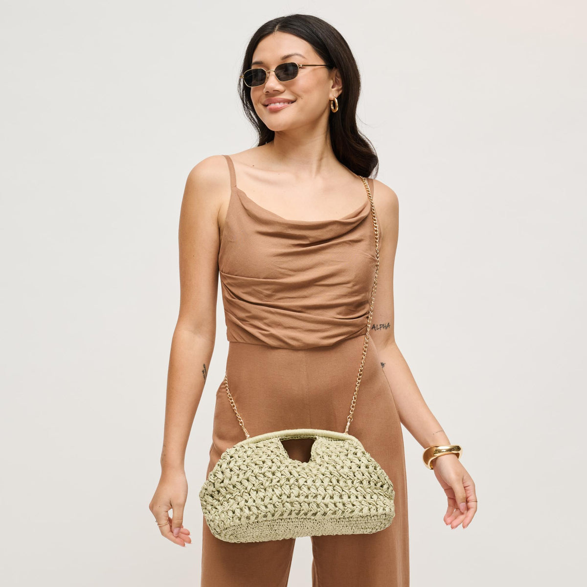 Woman wearing Sage Urban Expressions Abigail Crossbody 840504204135 View 2 | Sage