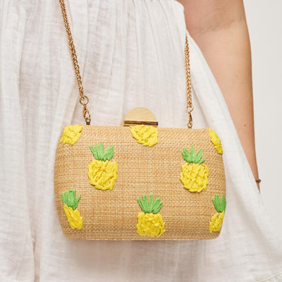 Woman wearing Pineapple Urban Expressions Pebbles Evening Bag 840504207938 View 1 | Pineapple