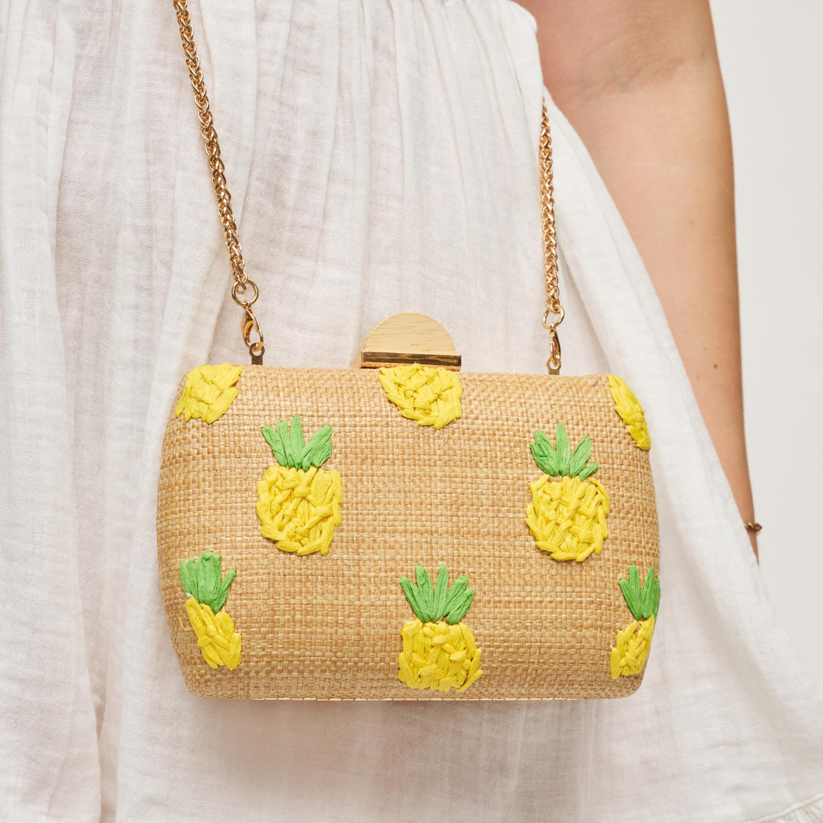 Woman wearing Pineapple Urban Expressions Pebbles Evening Bag 840504207938 View 1 | Pineapple