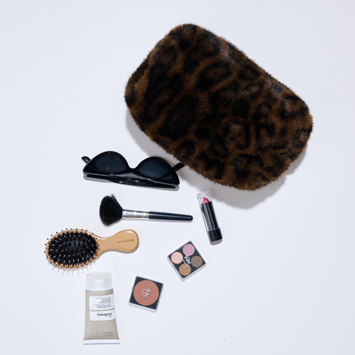 Woman wearing Leopard Urban Essentials Leopard Luxe Cosmetic & Travel Organizer Pouch 840611197771 View 2 | Leopard