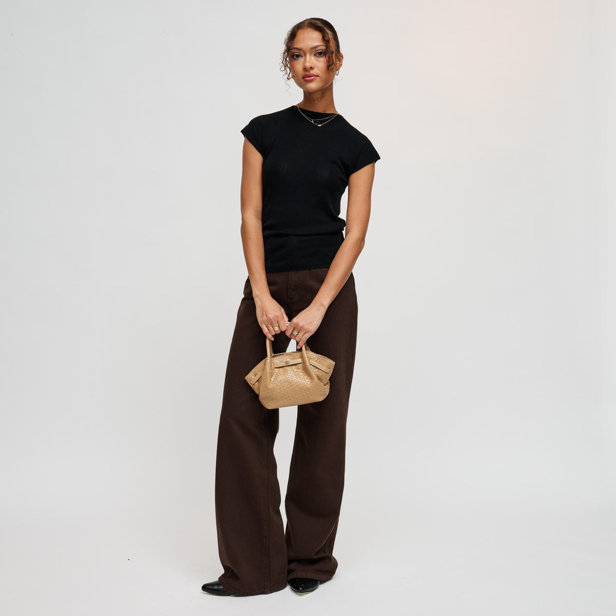 Woman wearing Natural Urban Expressions Selena - Embossed Woven Crossbody 840504212994 View 4 | Natural