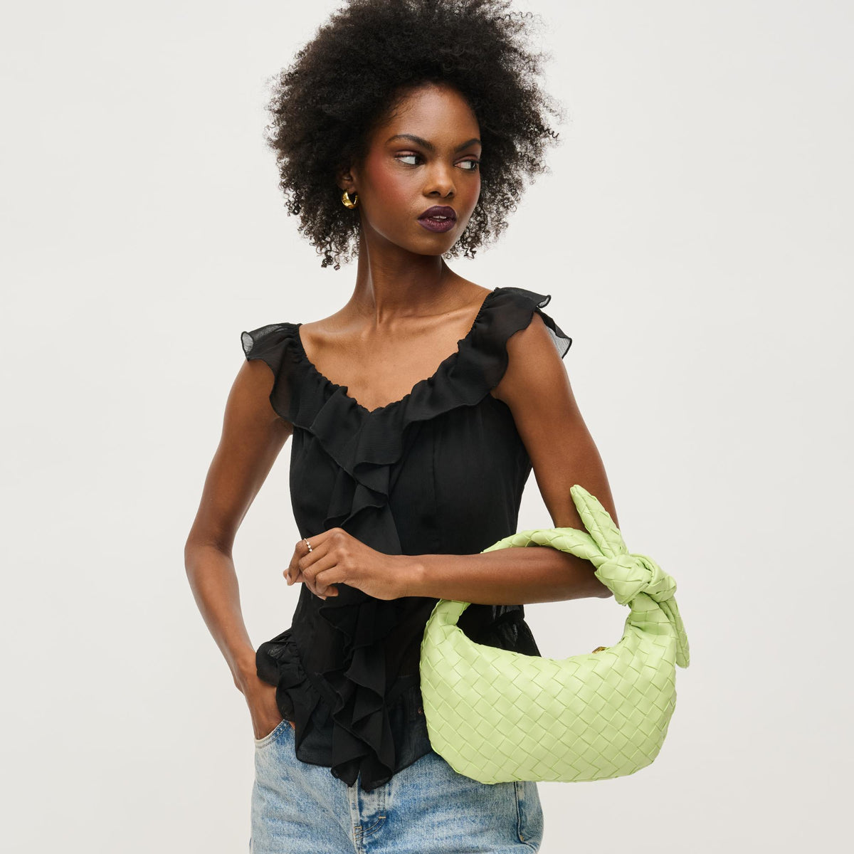 Woman wearing Pistachio Urban Expressions Lizbeth Clutch 840611148070 View 1 | Pistachio