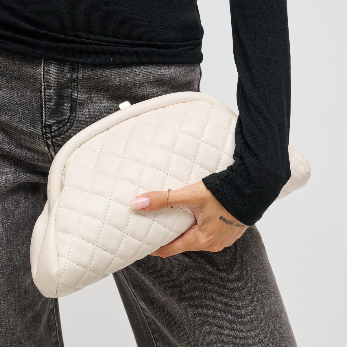 Woman wearing Oatmilk Urban Expressions Ava - Quilted Clutch 840504200670 View 1 | Oatmilk