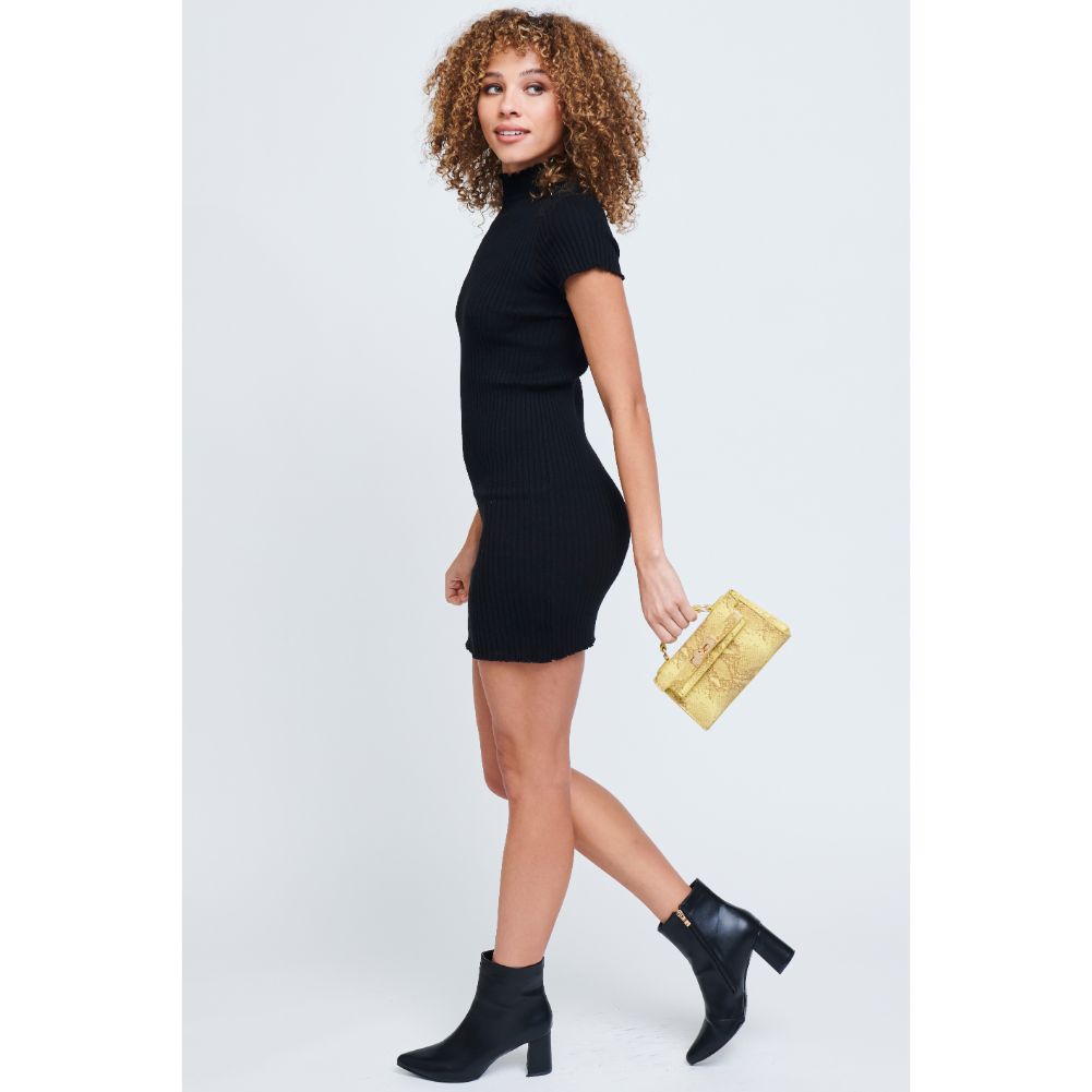 Woman wearing Canary Urban Expressions Georgina Snake Crossbody 840611171986 View 3 | Canary