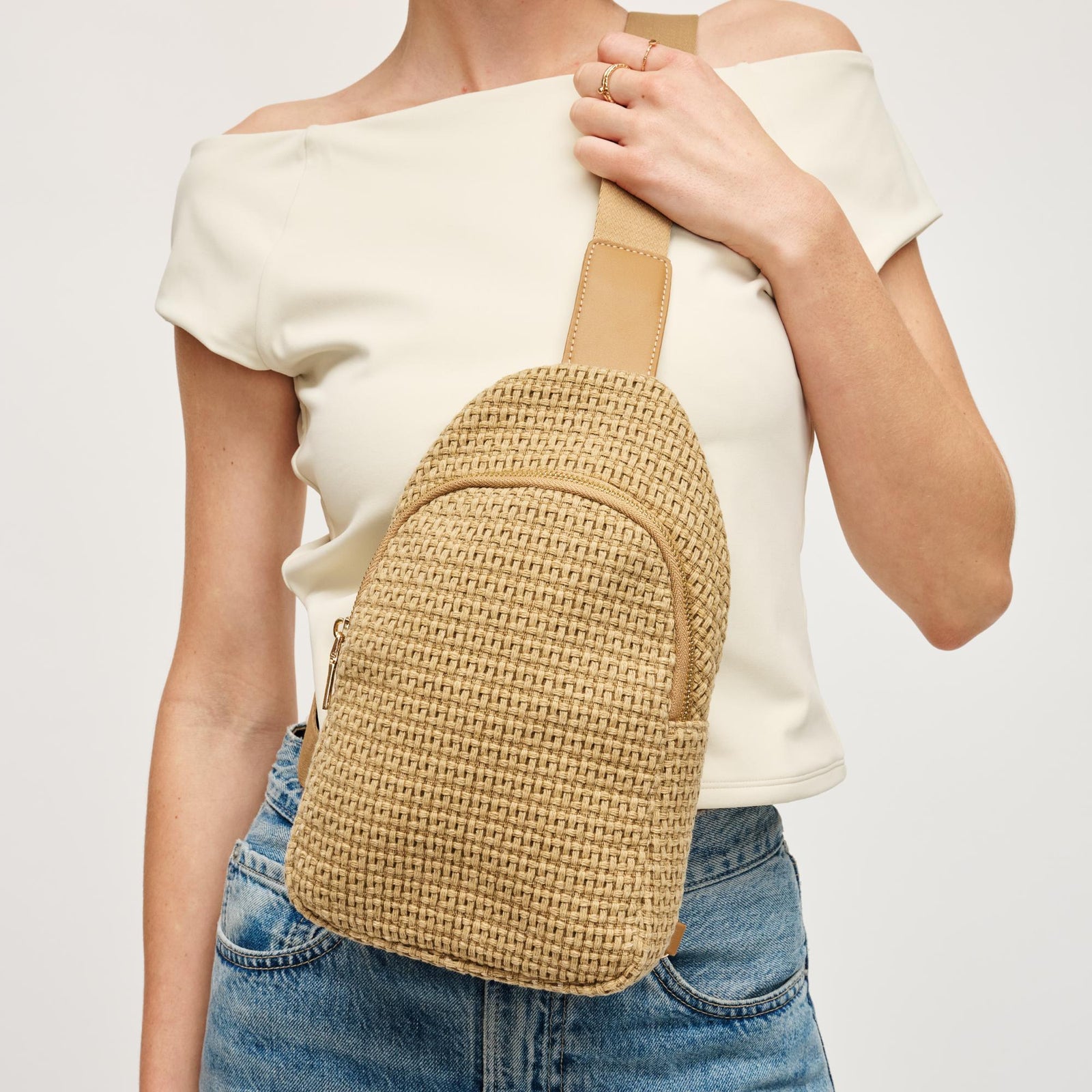 Woman wearing Natural Urban Expressions Jean Sling Backpack 840611146533 View 1 | Natural