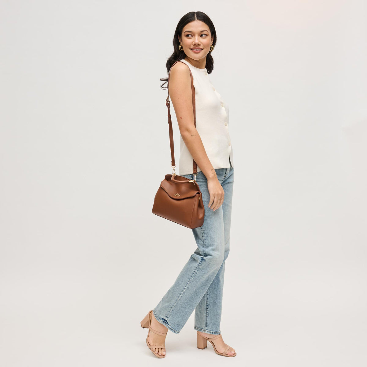 Woman wearing Chocolate Urban Expressions Liza Crossbody 840504208270 View 3 | Chocolate