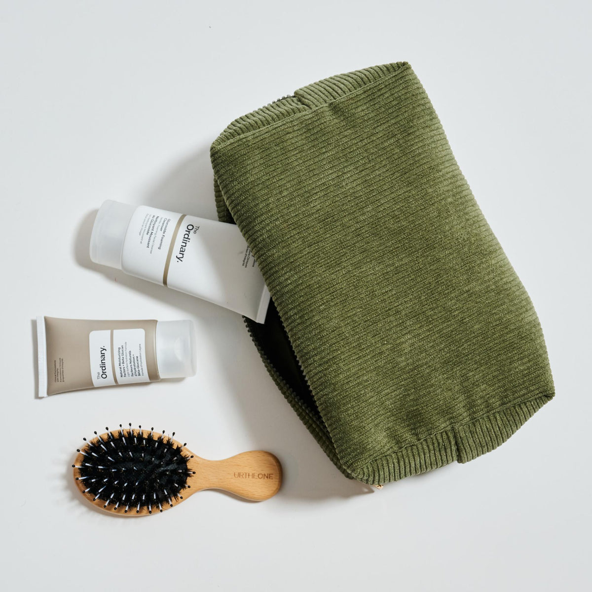 Woman wearing Sage Urban Essentials Cordially Yours - Corduroy Cosmetic & Travel Organizer Pouch 840611197023 View 1 | Sage