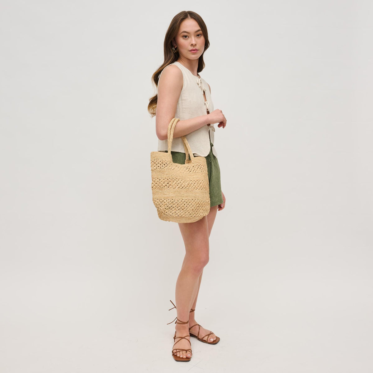 Woman wearing Natural Urban Expressions Brynn Tote 840611153852 View 4 | Natural