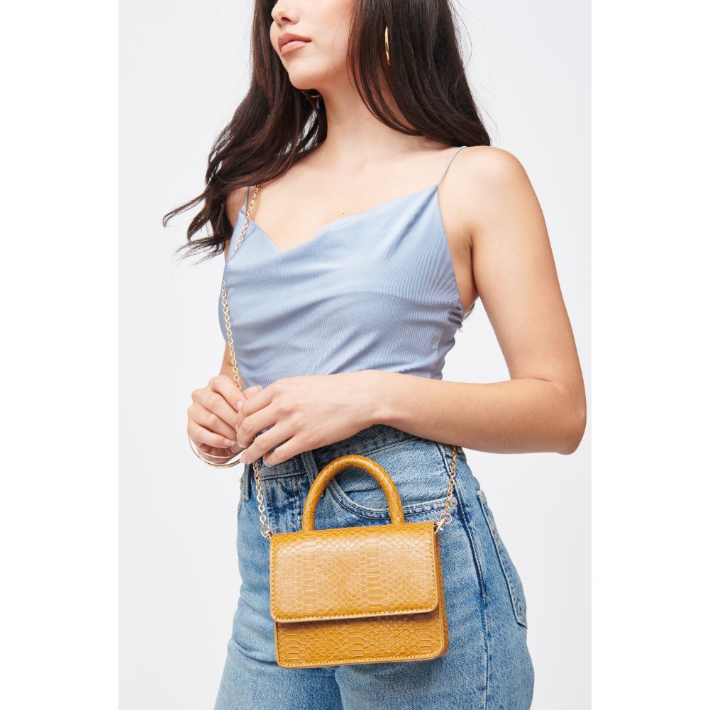Woman wearing Mustard Urban Expressions Faye Top Handle 840611184788 View 1 | Mustard