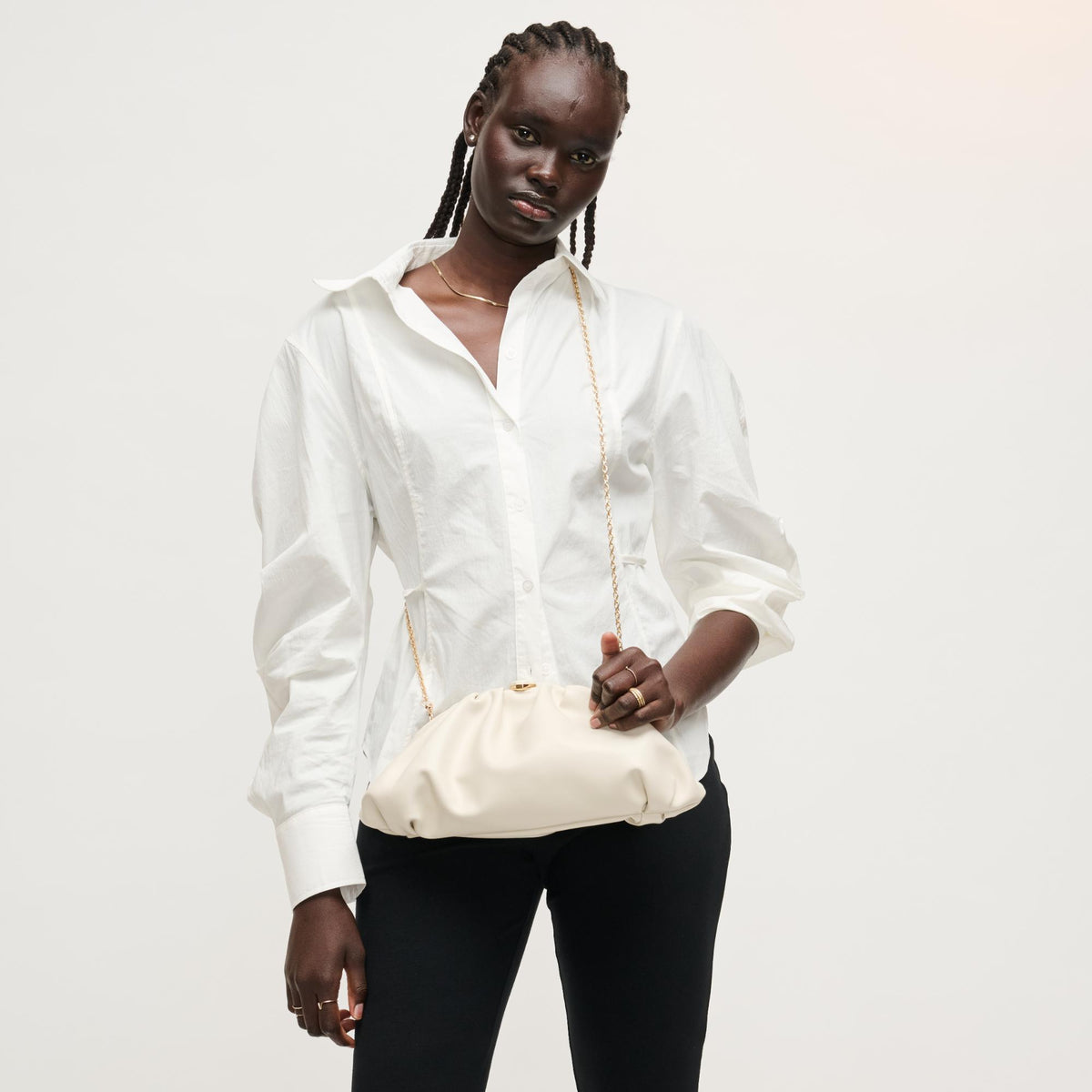 Woman wearing Ivory Urban Expressions Jennifer Clutch 840504208225 View 3 | Ivory