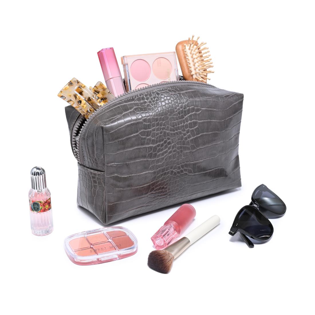 Woman wearing Natural Urban Essentials Croc Chic Cosmetic & Travel Organizer Pouch 840504210037 View 1 | Natural