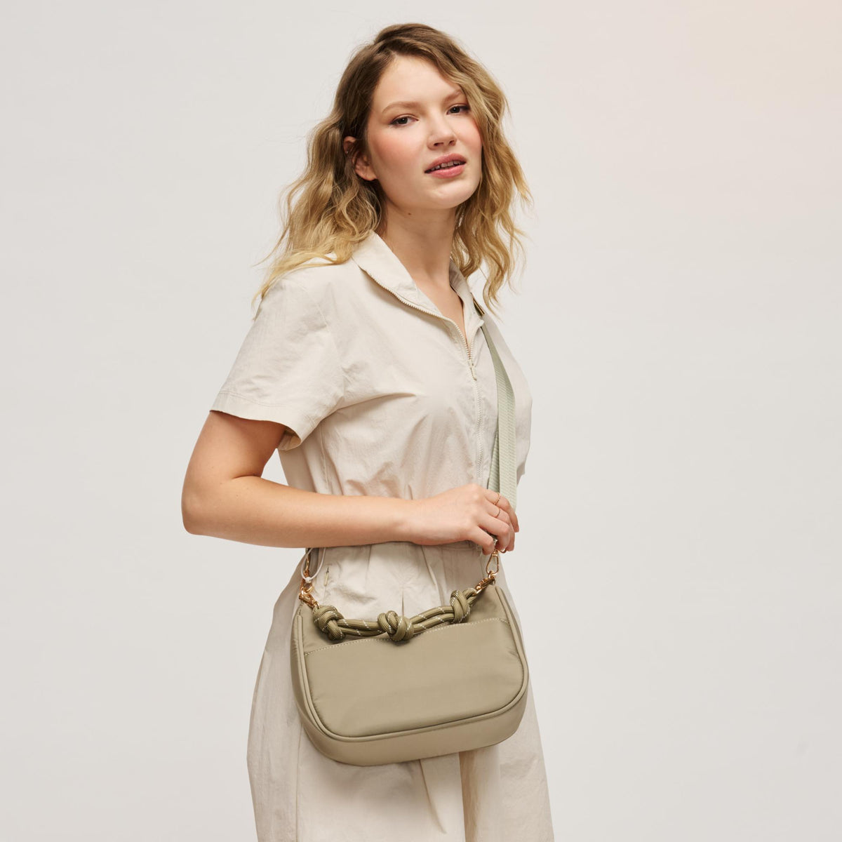 Woman wearing Sage Urban Expressions Joannie Crossbody 840504208683 View 1 | Sage