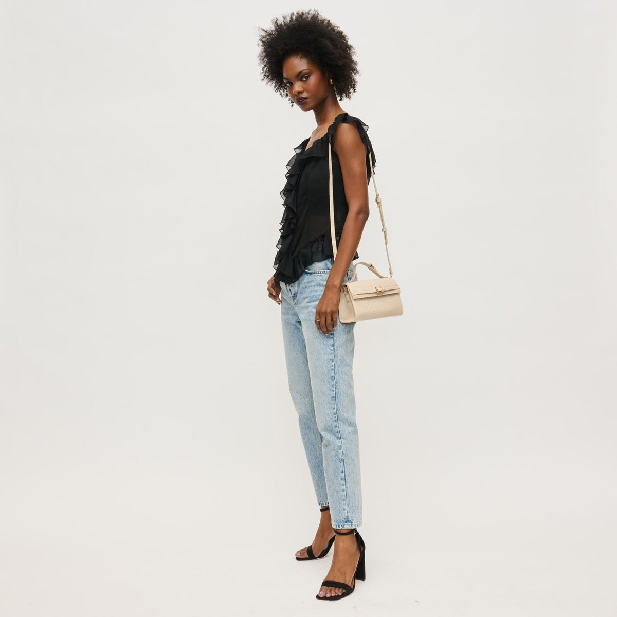 Woman wearing Bone Urban Expressions Thea Crossbody 840611149299 View 4 | Bone
