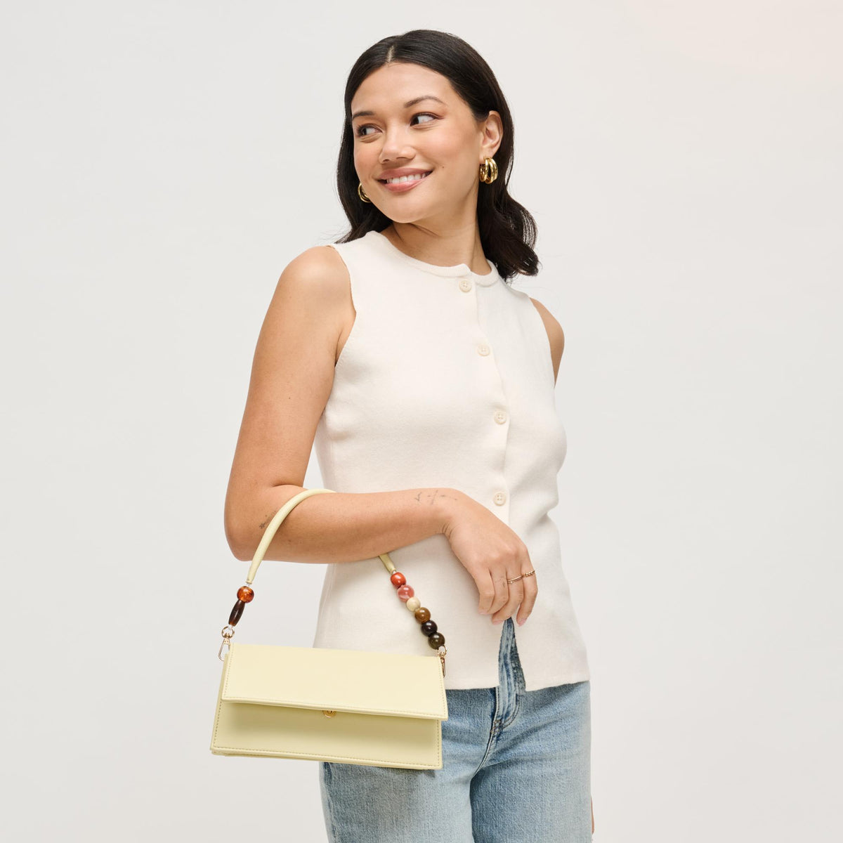 Woman wearing Butter Urban Expressions Brooks Crossbody 840504206641 View 2 | Butter
