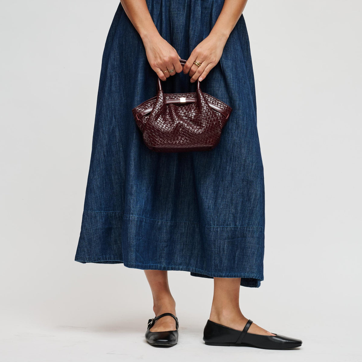 Woman wearing Burgundy Urban Expressions Selena - Embossed Woven Crossbody 840504212147 View 3 | Burgundy