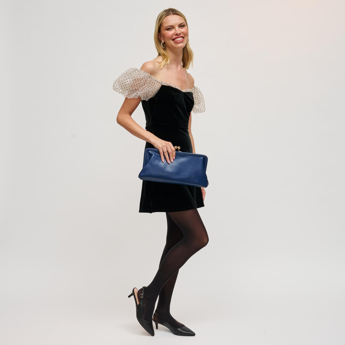 Woman wearing Midnight Urban Expressions Kristin Clutch 840611198433 View 2 | Midnight