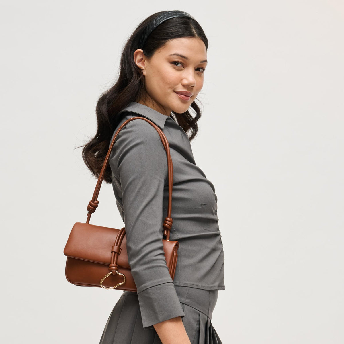 Woman wearing Chocolate Urban Expressions Belina Crossbody 840504206559 View 1 | Chocolate
