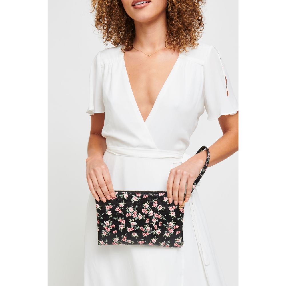 Woman wearing Black Urban Expressions Joan Floral Wristlet 840611181121 View 3 | Black