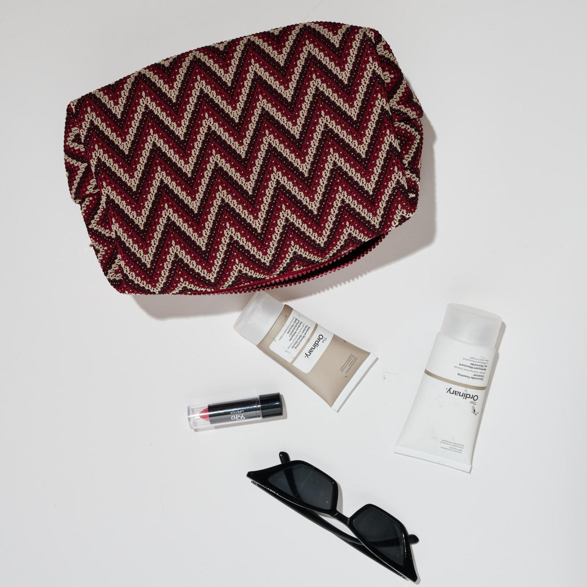 Woman wearing Red Multi Urban Essentials V-Muse Cosmetic & Travel Organizer Pouch 840611197788 View 1 | Red Multi