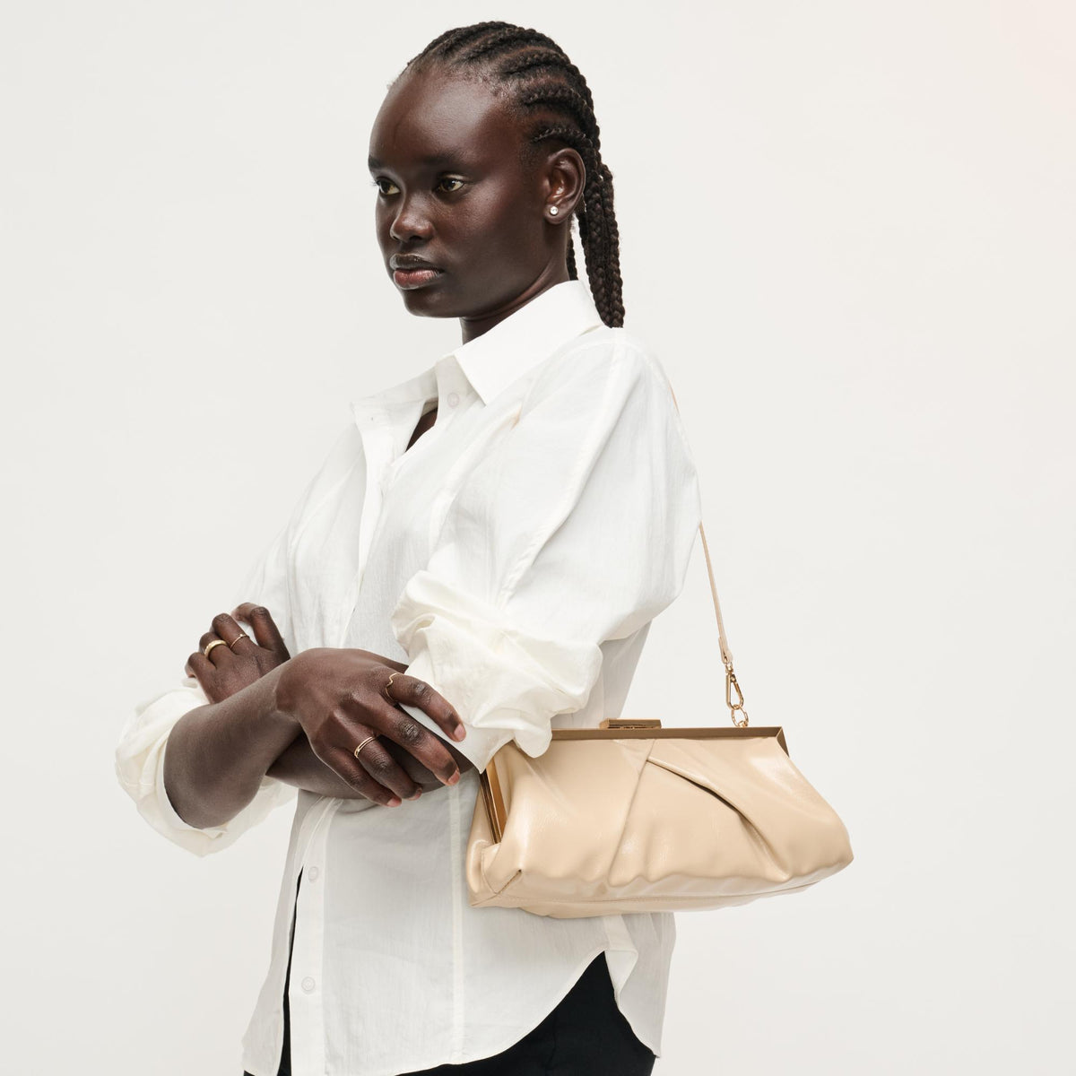 Woman wearing Nude Urban Expressions Scottie Crossbody 840504207990 View 3 | Nude