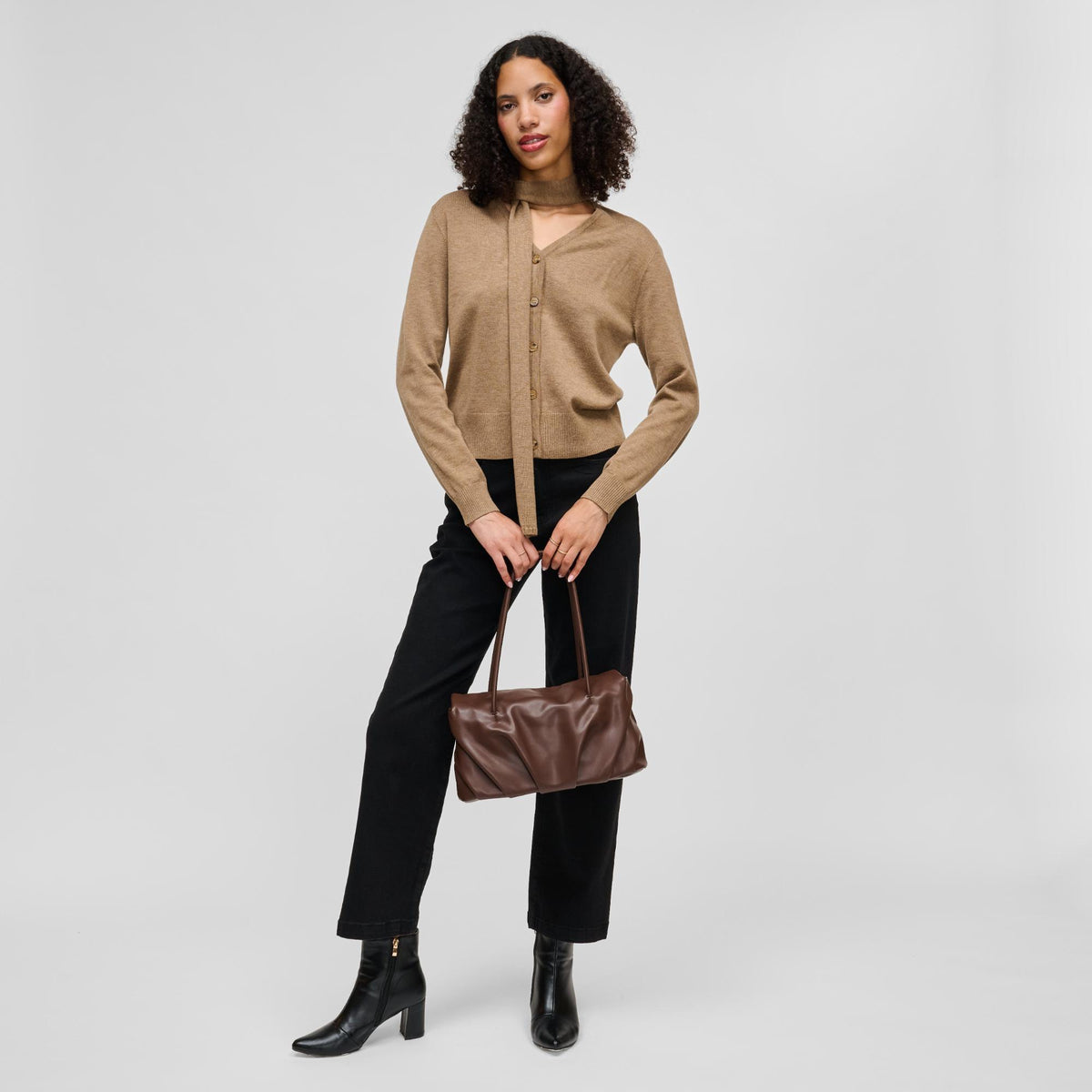 Woman wearing Chocolate Urban Expressions Ryker Satchel 840504213298 View 4 | Chocolate
