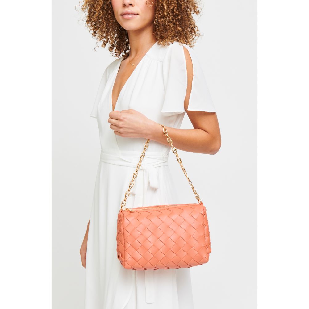 Woman wearing Coral Urban Expressions Elara Crossbody 840611179623 View 1 | Coral