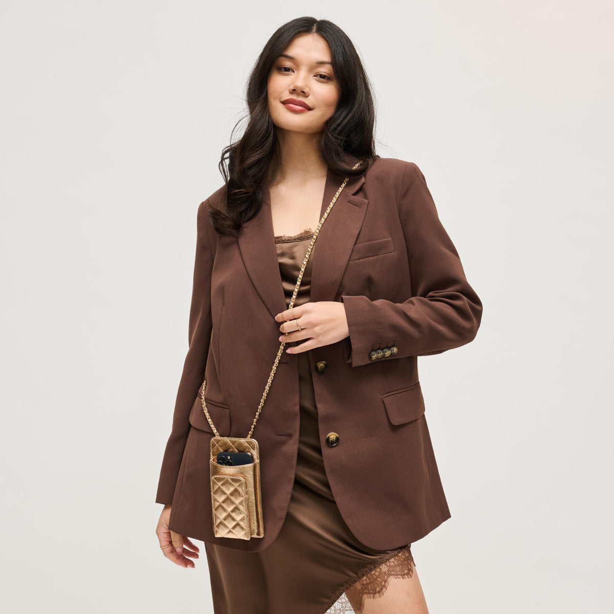 Woman wearing Rose Gold Urban Expressions Brianna 2.0 Cell Phone Crossbody 840504203794 View 2 | Rose Gold