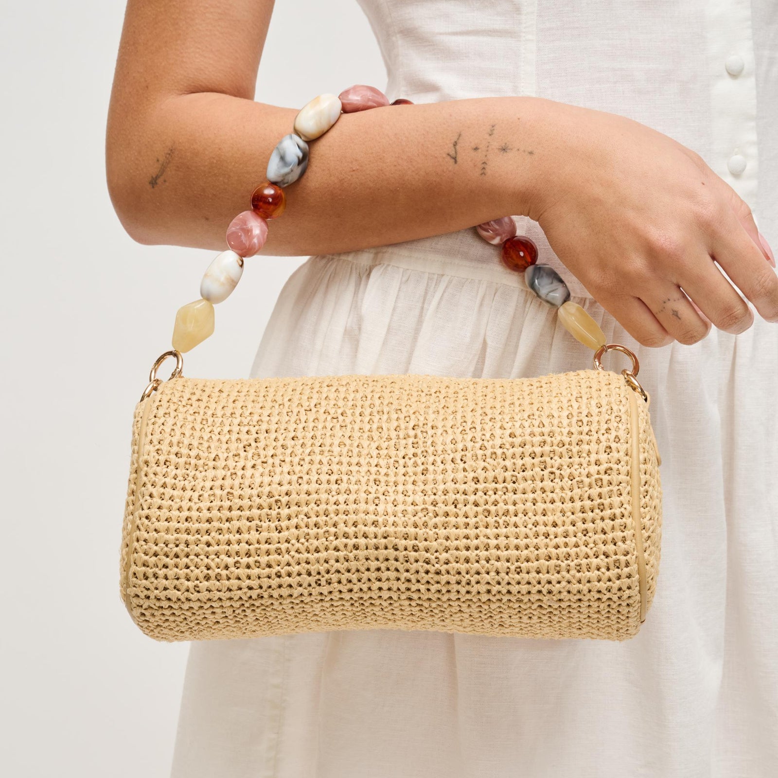 Woman wearing Chocolate Urban Expressions Rachel - Straw Clutch 840504206221 View 1 | Chocolate