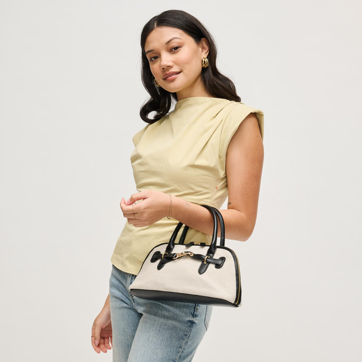 Woman wearing Ivory Black Urban Expressions Amelia Crossbody 840504207884 View 2 | Ivory Black