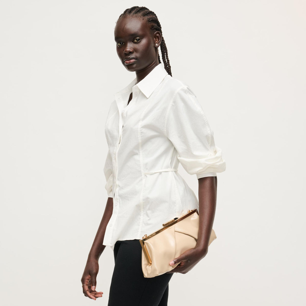 Woman wearing Nude Urban Expressions Scottie Crossbody 840504207990 View 4 | Nude