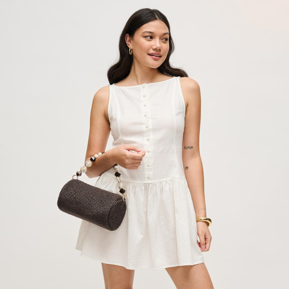 Woman wearing Chocolate Urban Expressions Rachel - Straw Clutch 840504206221 View 1 | Chocolate