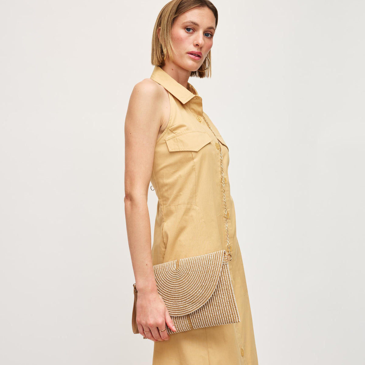 Woman wearing Natural Urban Expressions Melanie Clutch 840611152947 View 2 | Natural