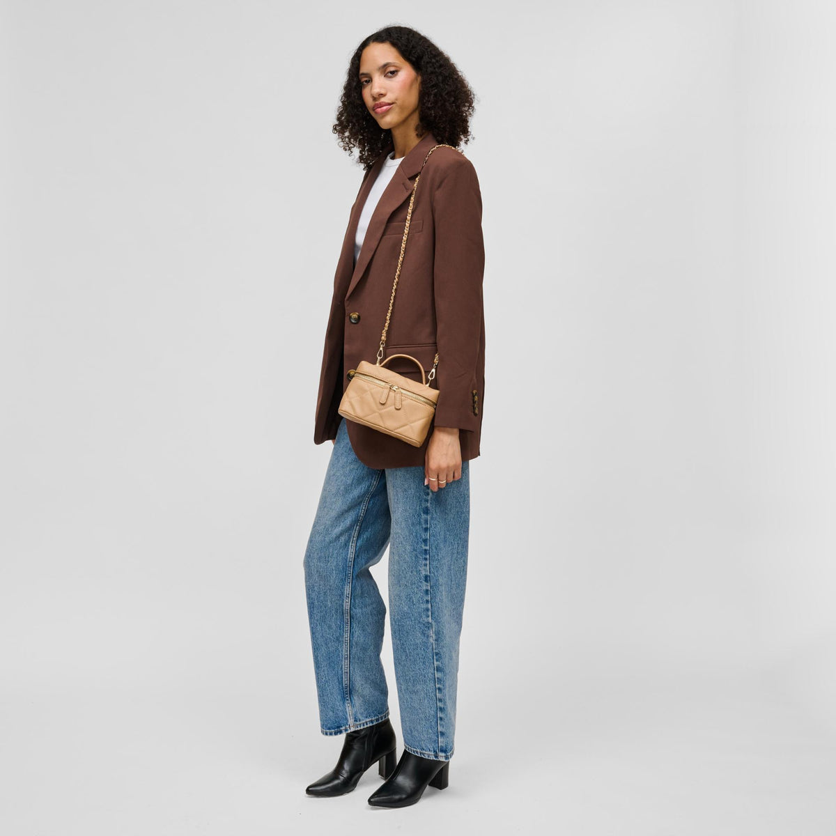 Woman wearing Natural Urban Expressions Snow Crossbody 840504215377 View 4 | Natural