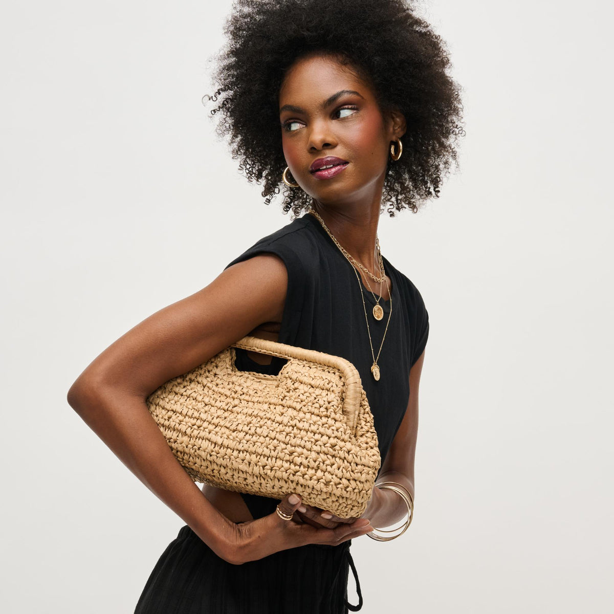 Woman wearing Natural Urban Expressions Lani Clutch 840611151629 View 1 | Natural