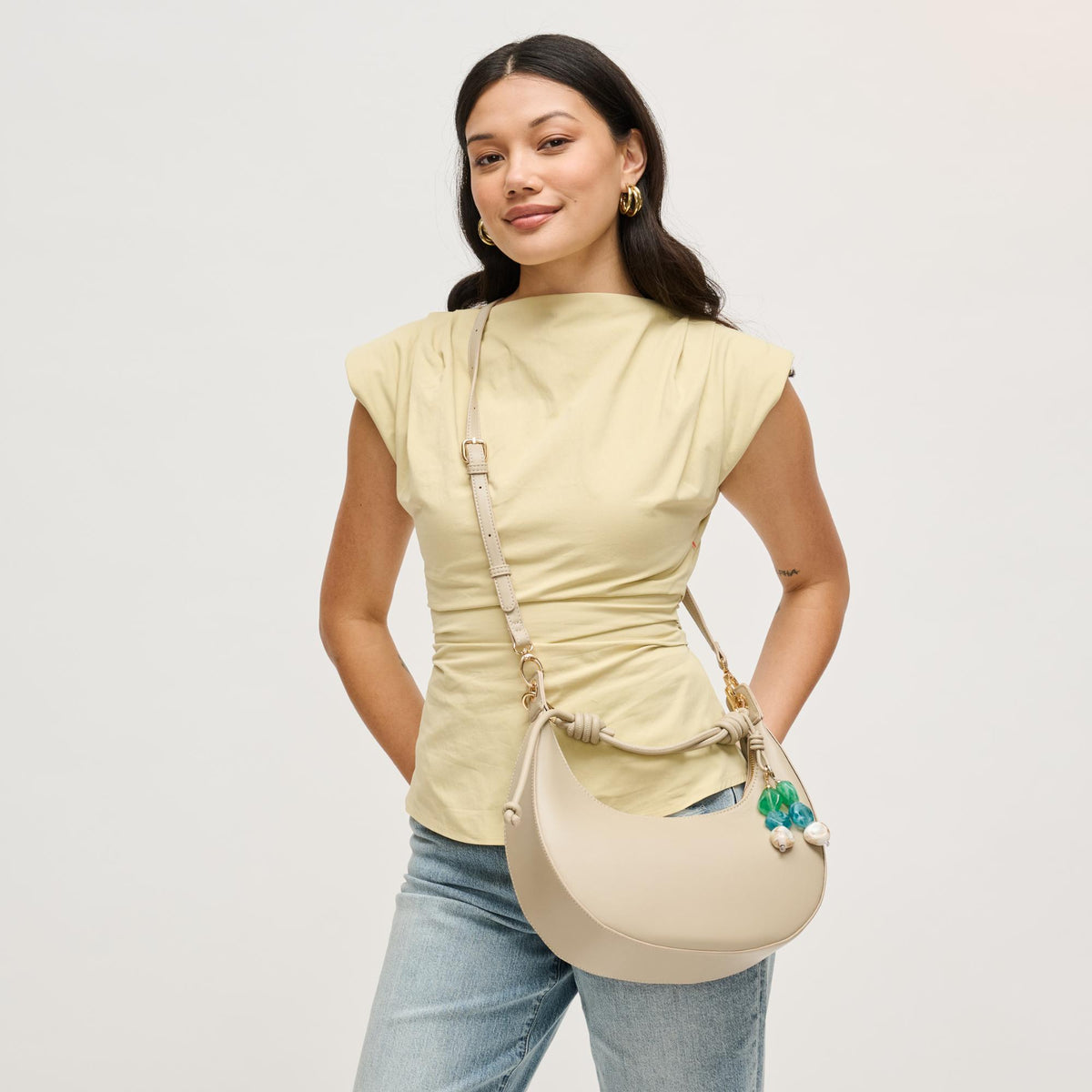 Woman wearing Sage Urban Expressions Emilia Hobo 840504206467 View 2 | Sage