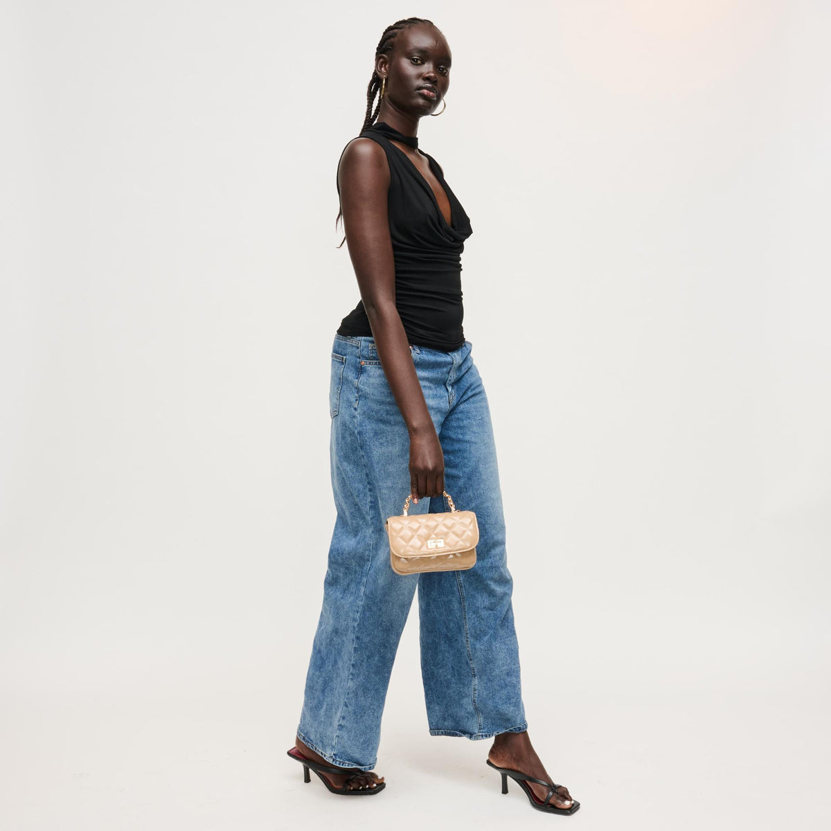 Woman wearing Natural Urban Expressions Leo Crossbody 840504205071 View 4 | Natural