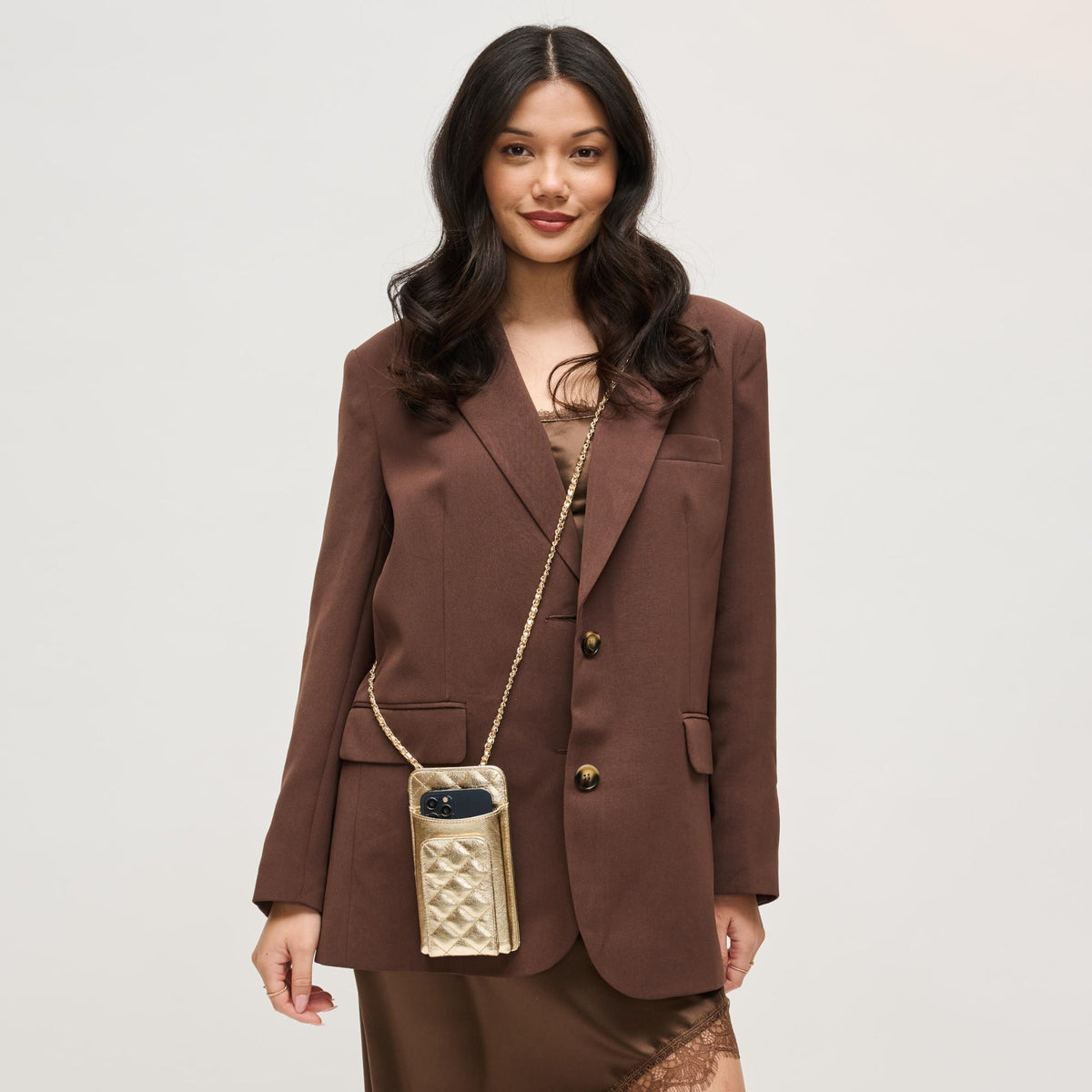 Woman wearing Light Gold Urban Expressions Brianna 2.0 Cell Phone Crossbody 840504203787 View 2 | Light Gold