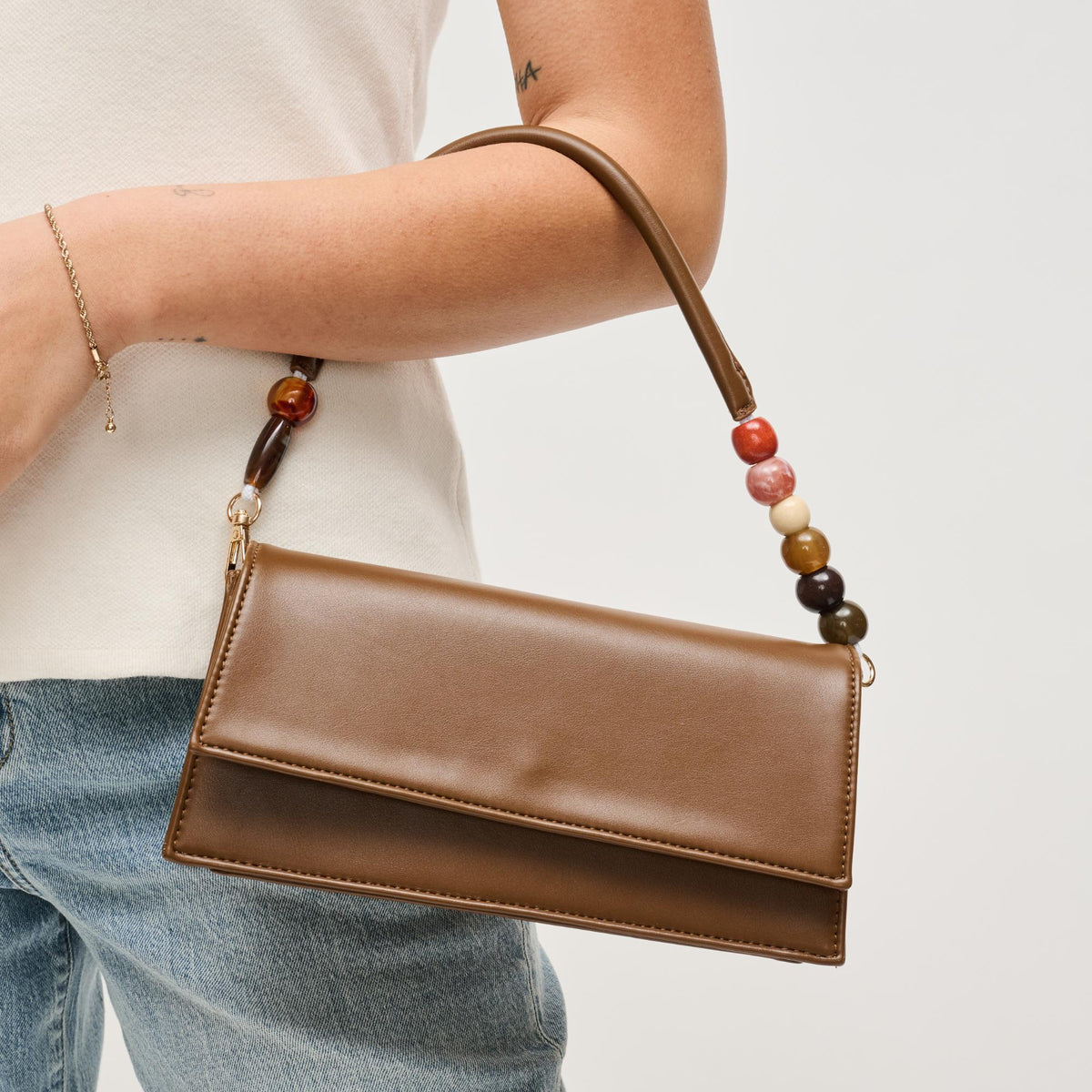 Woman wearing Chocolate Urban Expressions Brooks Crossbody 840504206665 View 3 | Chocolate