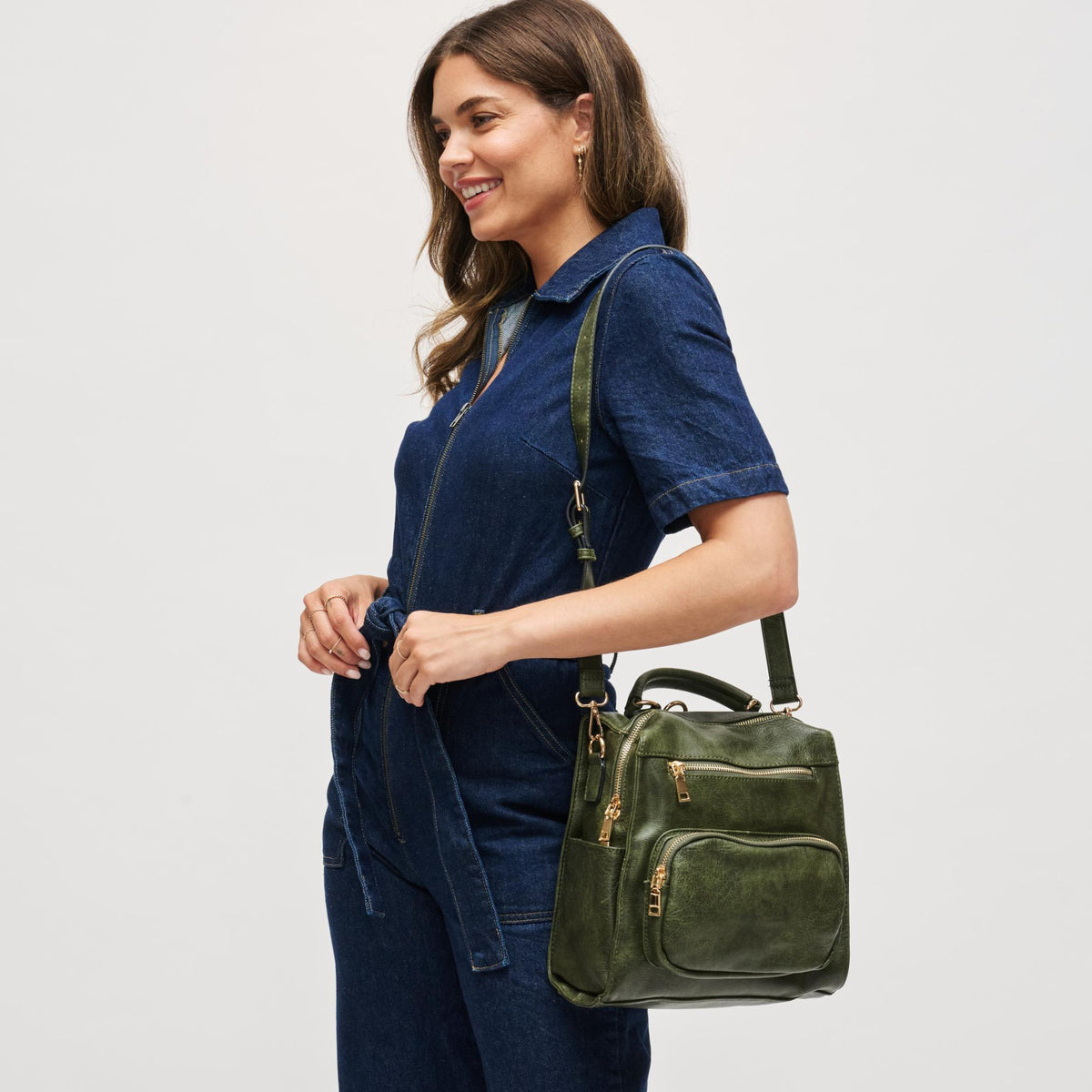 Woman wearing Olive Urban Expressions Miles Backpack NA-840611166753 View 3 | Olive
