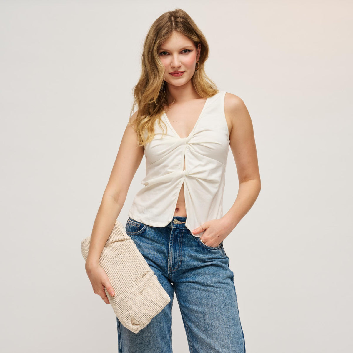 Woman wearing Ivory Urban Expressions Franny - Seasonal Clutch 840504208539 View 3 | Ivory