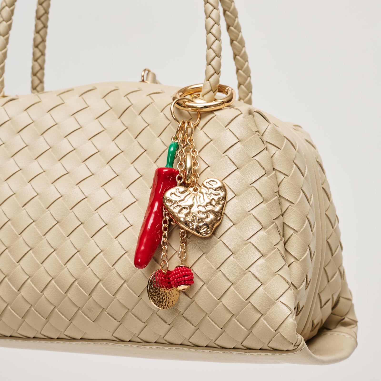 Woman wearing Gold Red Urban Expressions Chili Keychain Charm 840504209161 View 1 | Gold Red