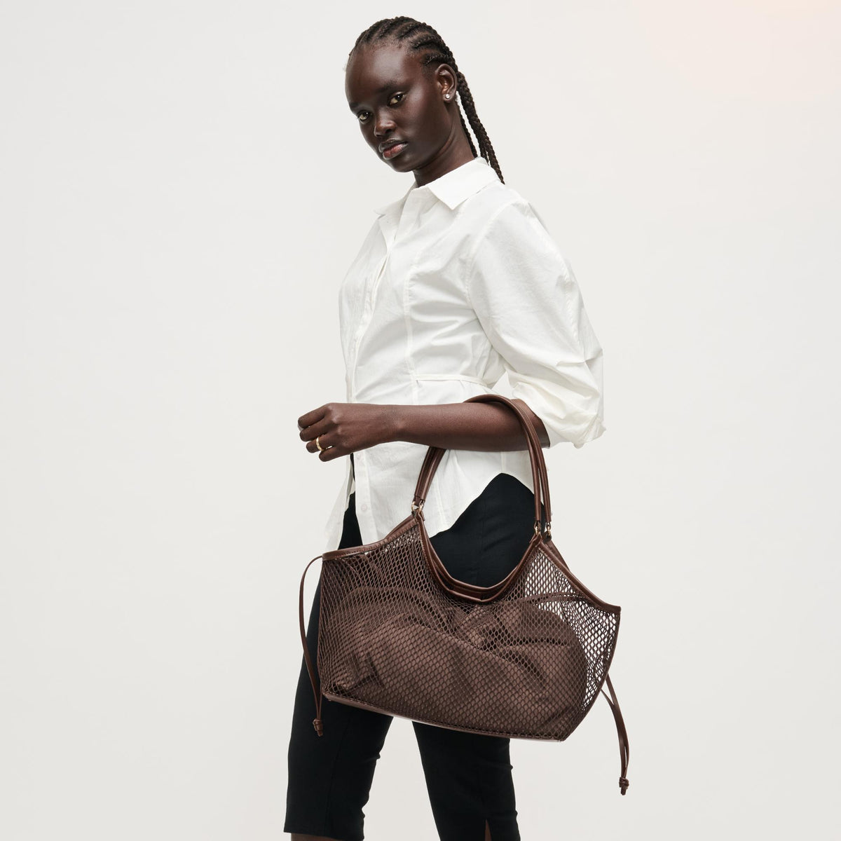 Woman wearing Chocolate Urban Expressions Easton Tote 840504205200 View 3 | Chocolate