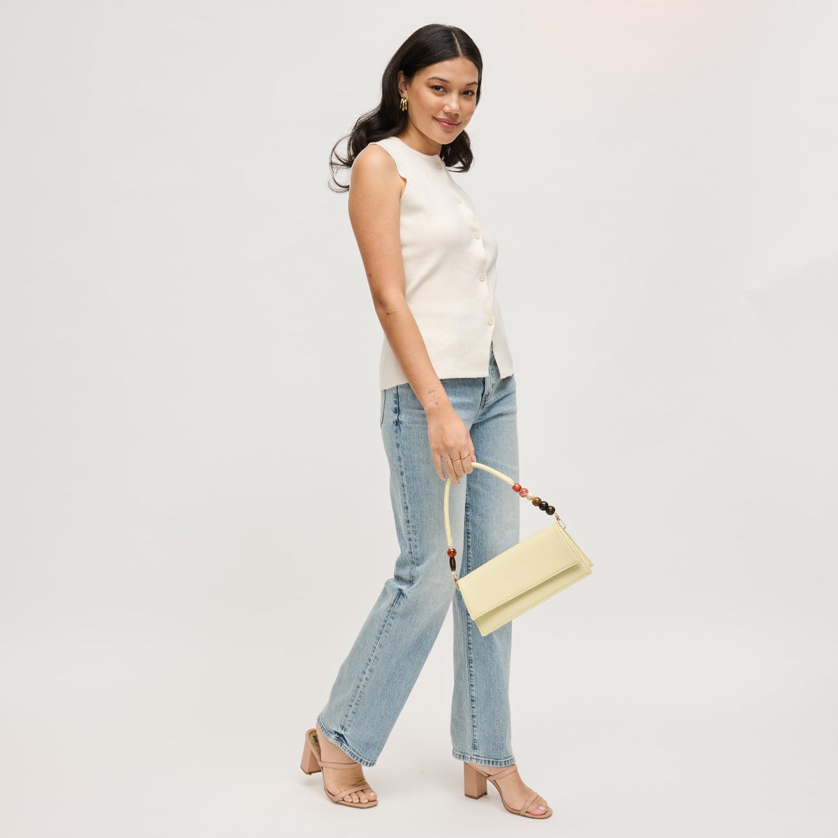 Woman wearing Butter Urban Expressions Brooks Crossbody 840504206641 View 3 | Butter