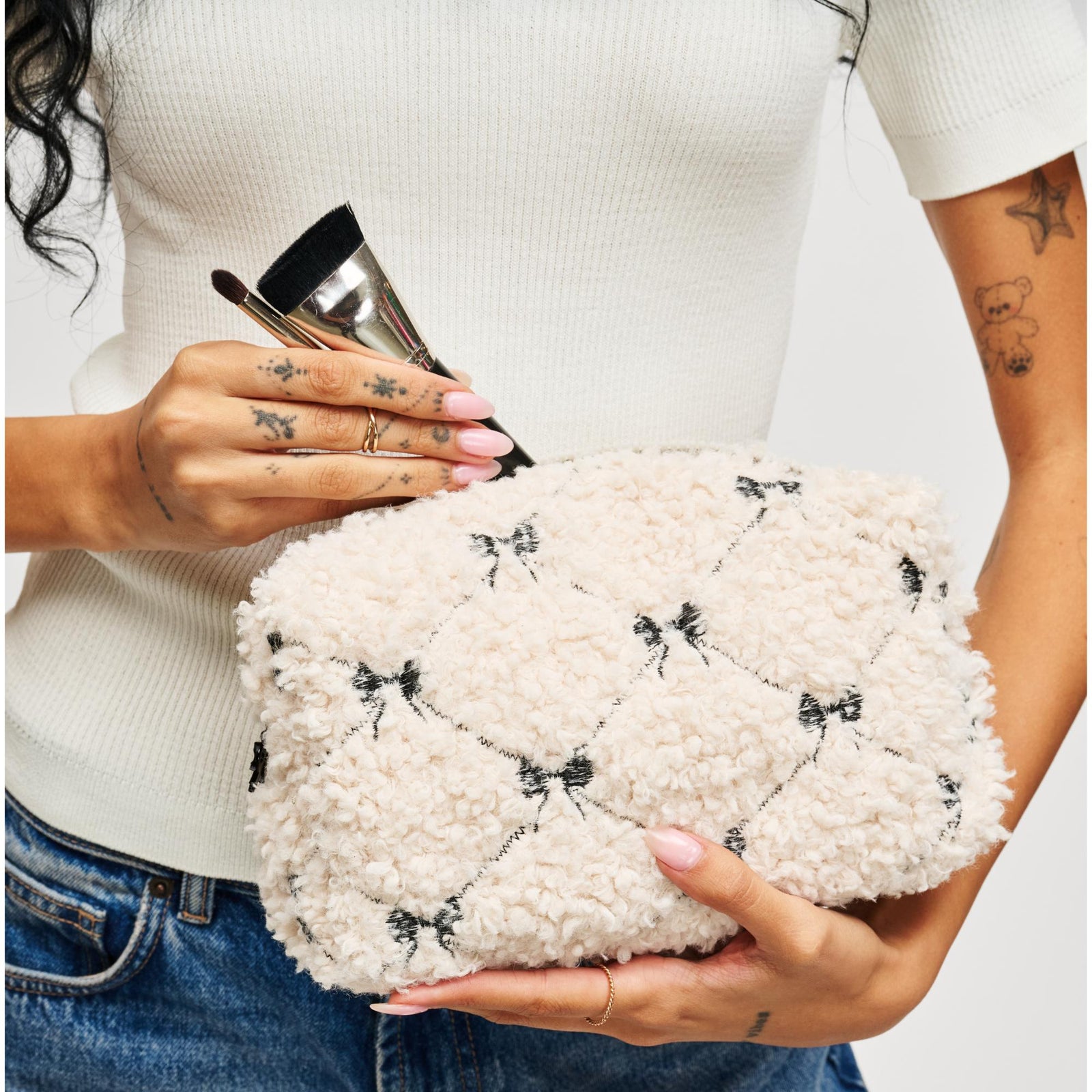 Woman wearing Cream Black Urban Essentials Chérie Chic Cosmetic & Travel Organizer Pouch 840611197238 View 1 | Cream Black