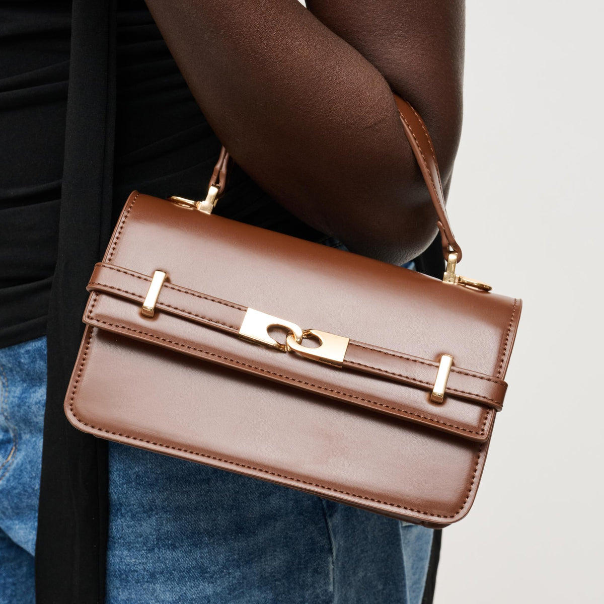 Woman wearing Chocolate Urban Expressions Lily Crossbody 840504205804 View 1 | Chocolate