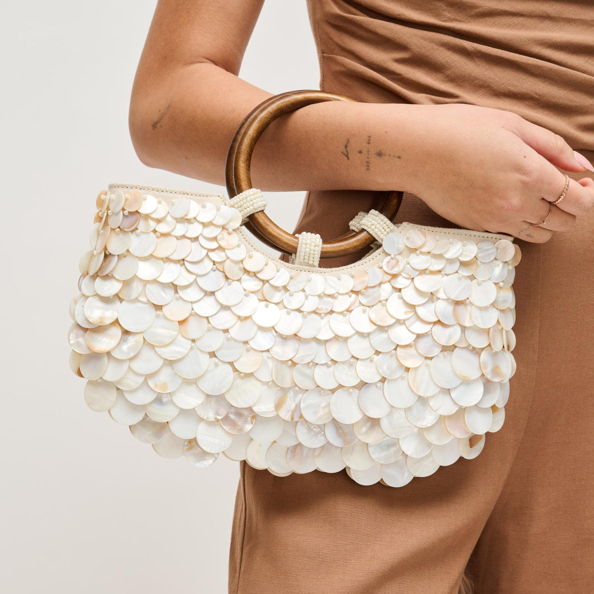 Woman wearing Ivory Multi Urban Expressions Scarlett Evening Bag 840504204821 View 1 | Ivory Multi