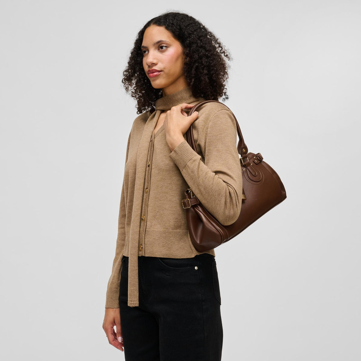 Woman wearing Brown Urban Expressions Moda Satchel 840504211690 View 3 | Brown