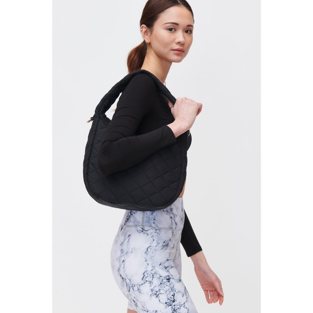 Woman wearing Black Urban Expressions Sonoma - Quilted Nylon Hobo 840611118455 View 2 | Black